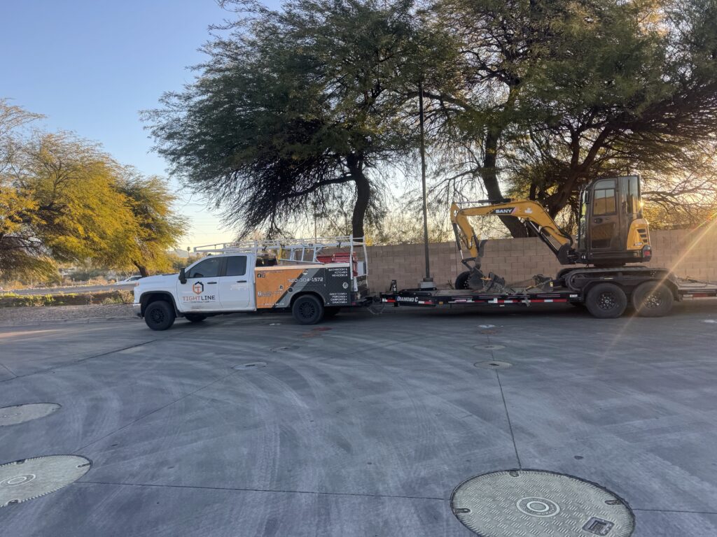 Tightline Construction truck and equipment at Tucson job site